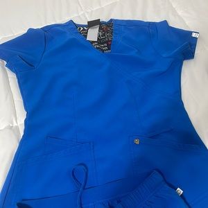 sofia vergara careisma scrubs. set small blue